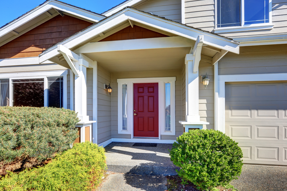 Entrance porch with red front door