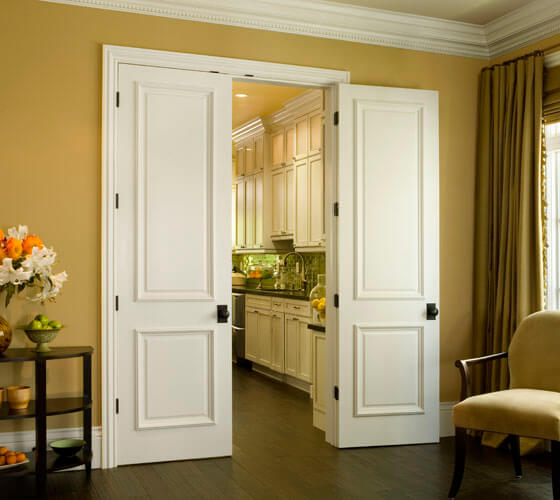 white wooden swinging interior door