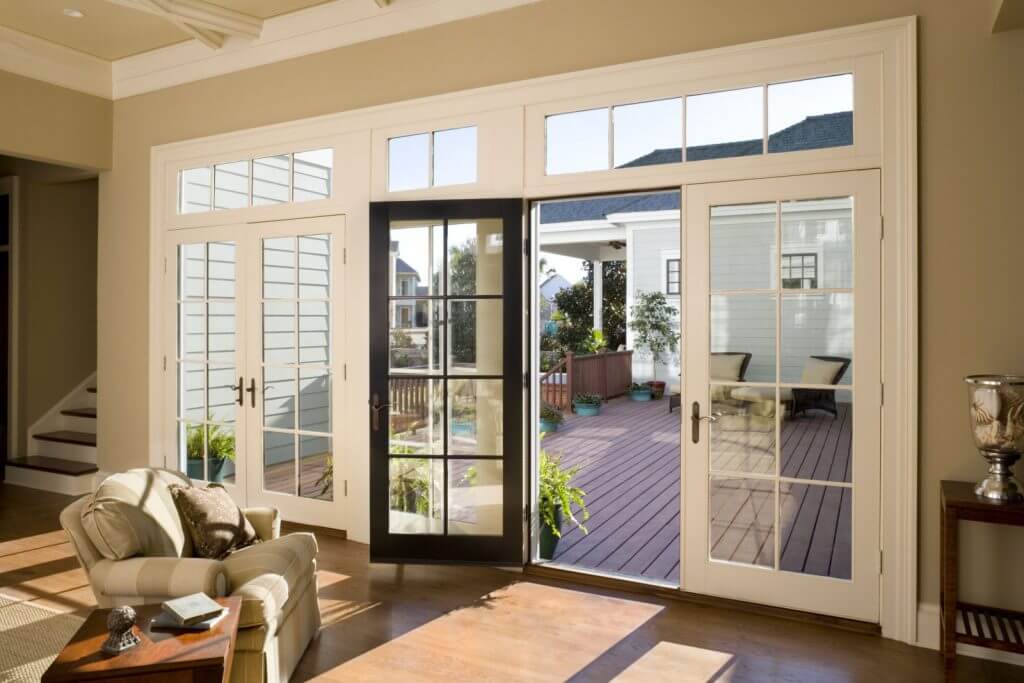 wood clad opening swinging patio door